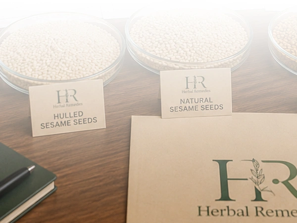 sample dishes of both hulled and natural sesame seeds branded with herbal remedies company logo